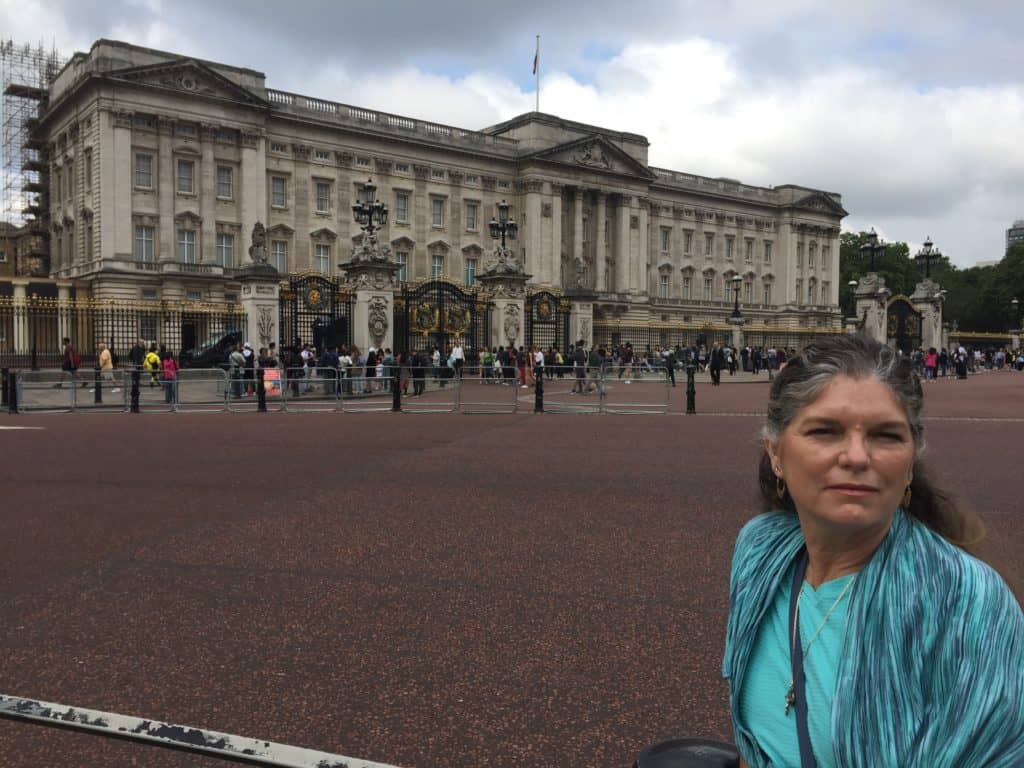 Standing in front of Buckingham Palace