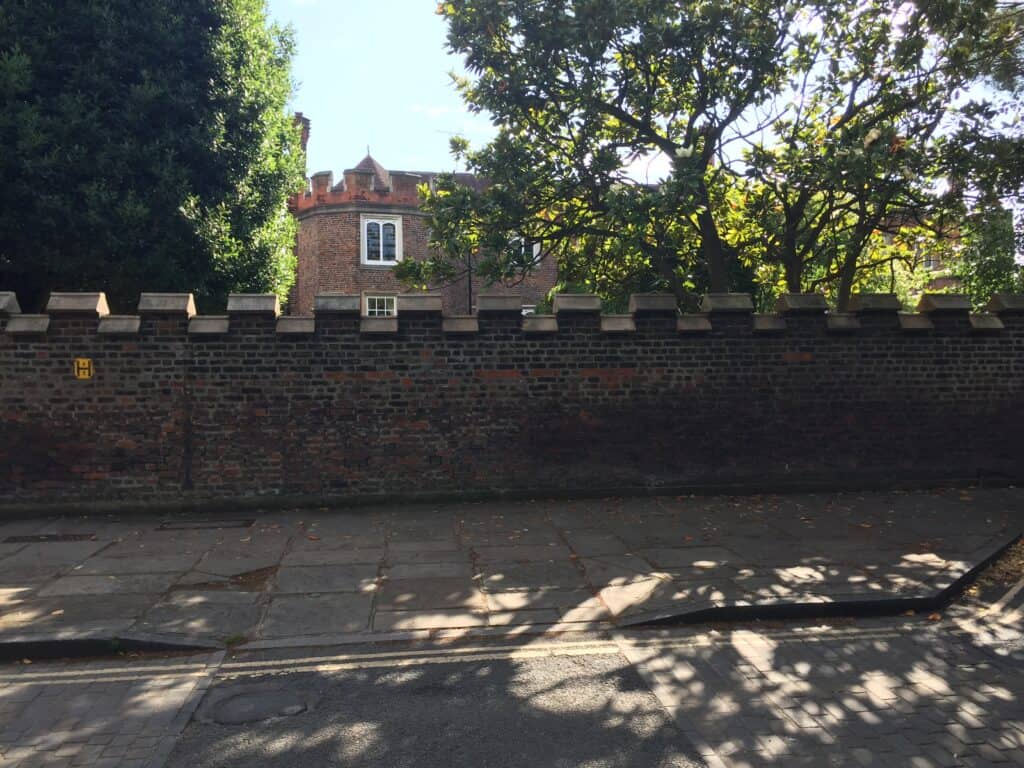 Brick wall surrounding the former grounds of Richmond Palace - vacation home for and WWII vacation home for Bolesław Dobrucki as guest of Virginia Cherill