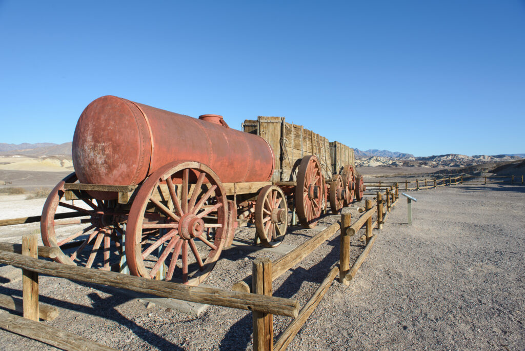 Wagon remnant at Harmony Borax Works in Death Valley National Park. Photo by Mesquite Flat Sand Dunes in Death Valley National Park - photo by https://theplaceswherewego.com/