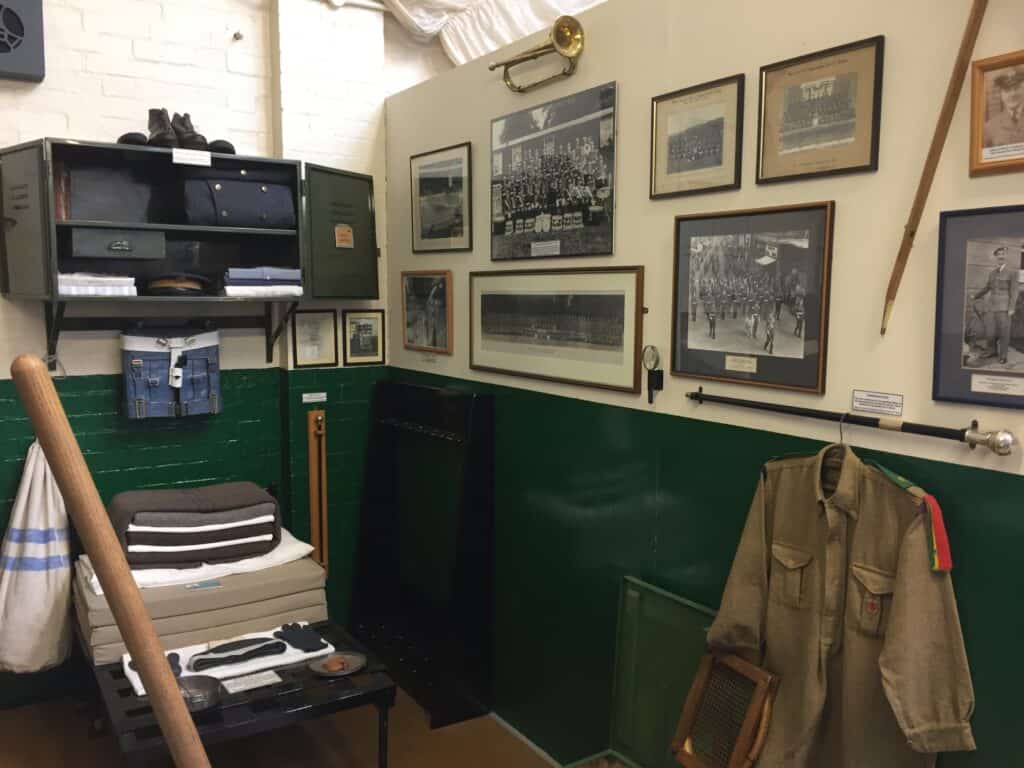 Photos on wall at Apprentice's Barrack Room recreation at Trenchard Museum at RAF Halton