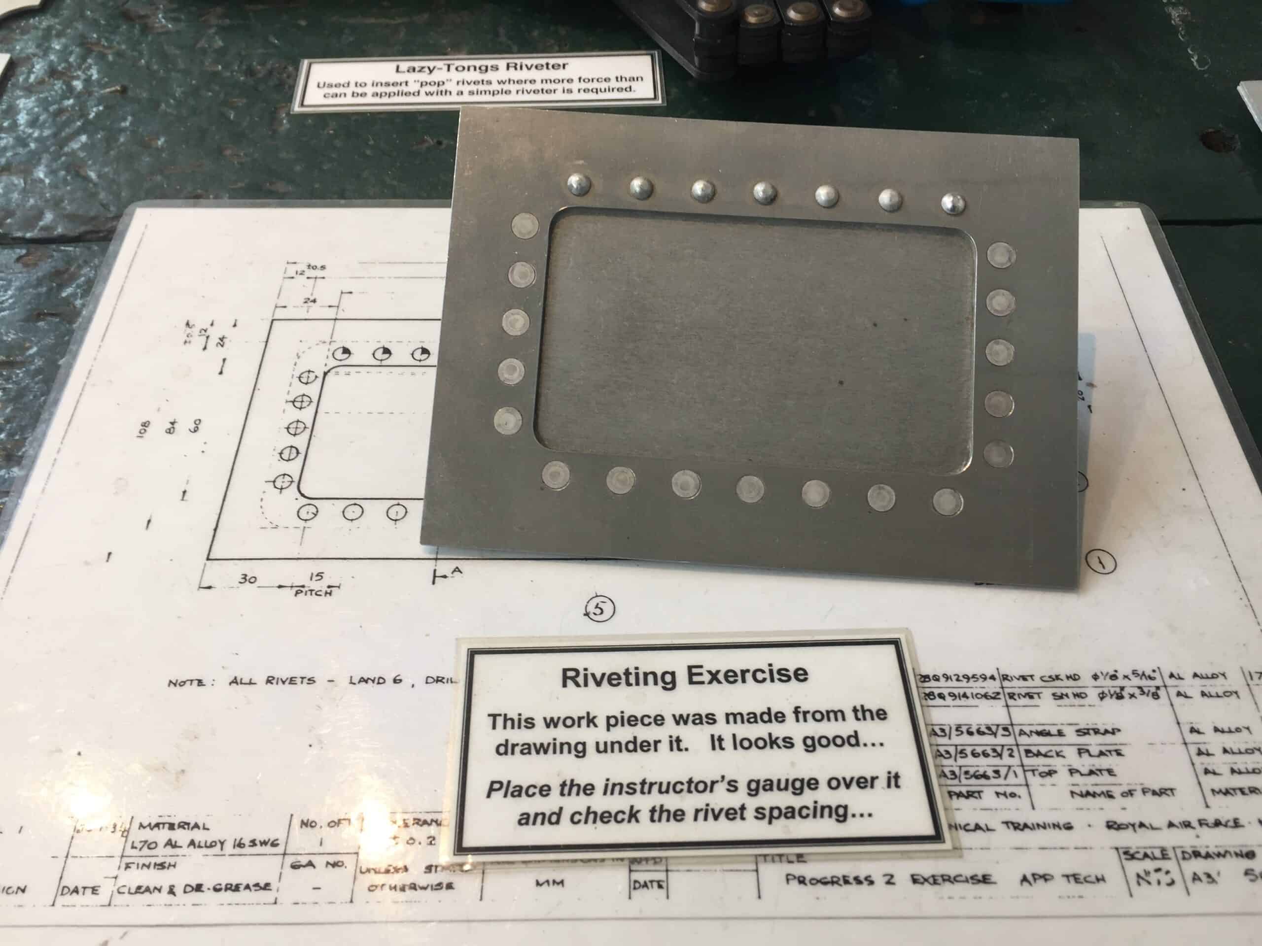 Riveting exercise example from the Trenchard Museum. This image shows a riveting item produced as a result of referencing a technical drawing.