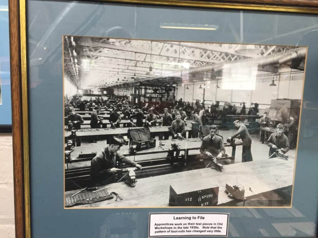 Photo of technical training apprentices at RAF Halton learning to file during the 1930s