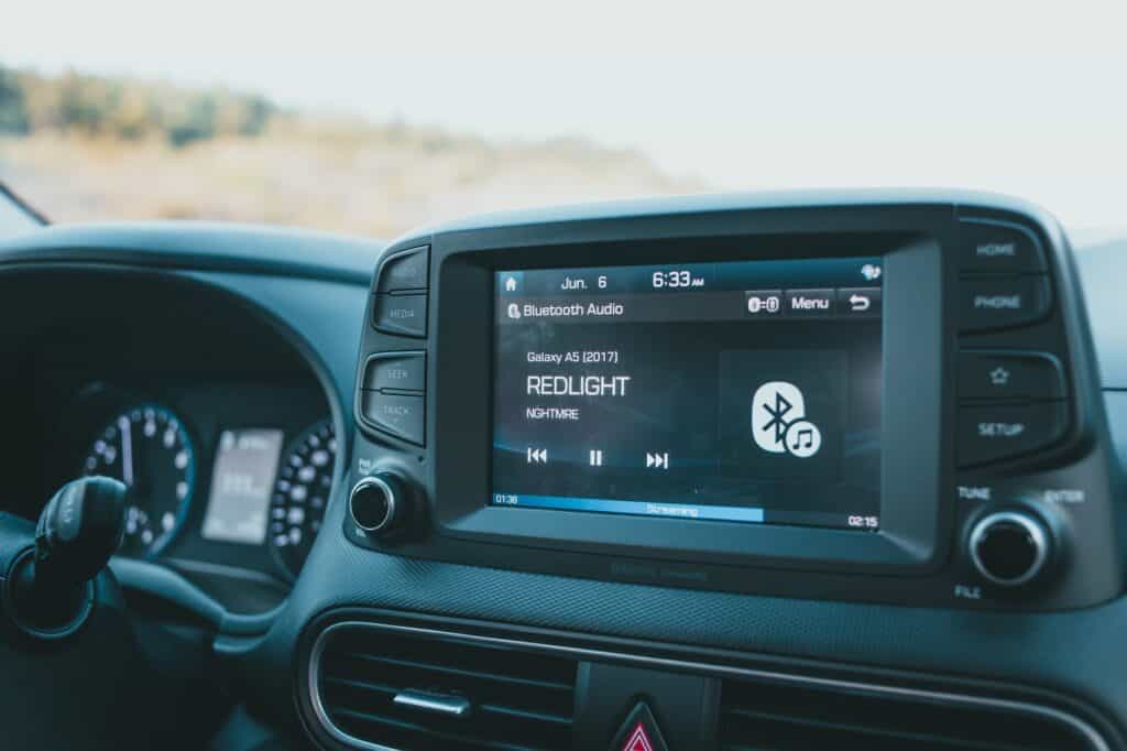 close up of a radio in a car