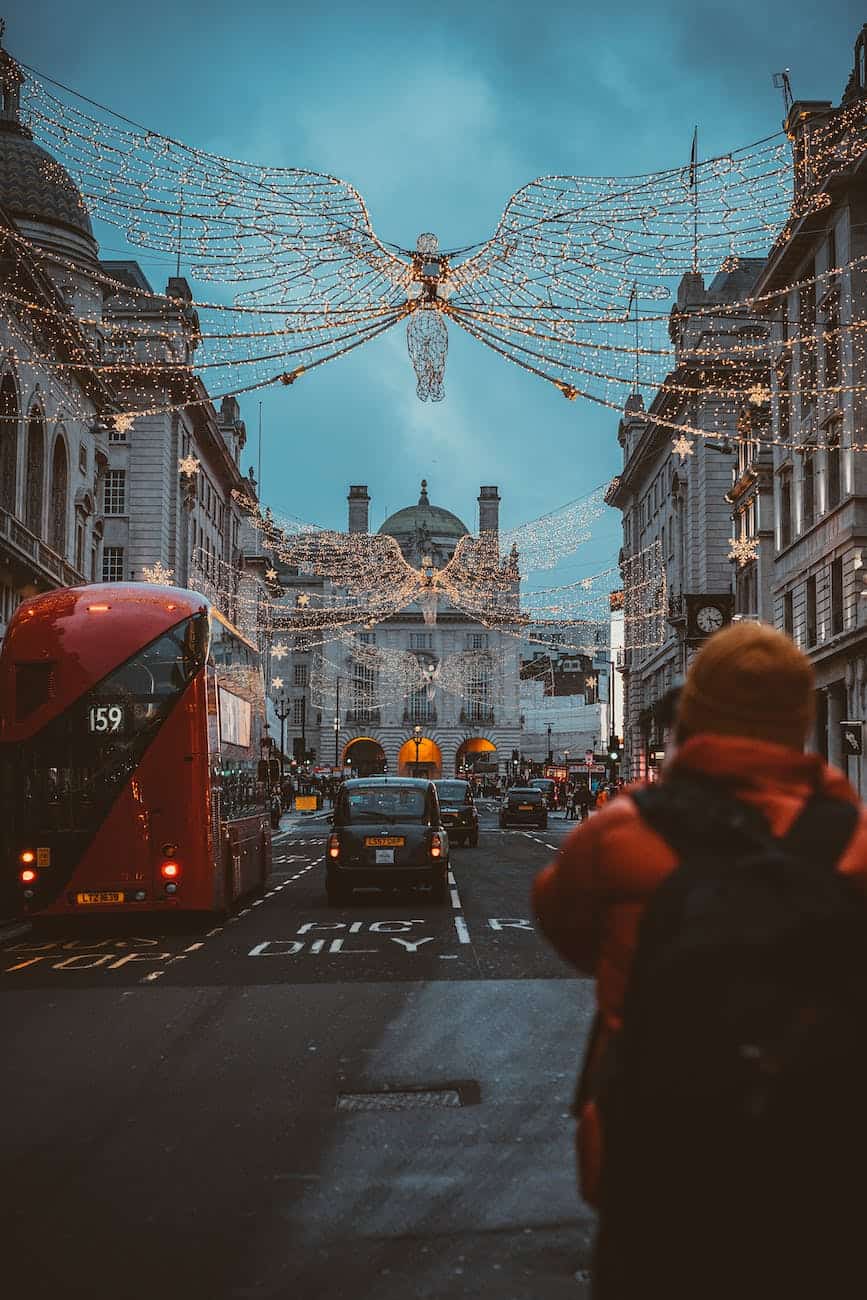 view of regent street in the city of westminster in london decorated with angel lights for christmas