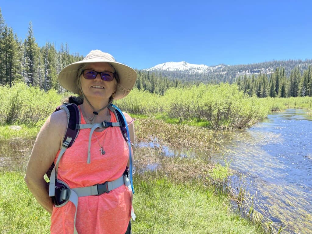 Julie from The Places Where We Go in a landscape view at Lassen Volcanic National Park