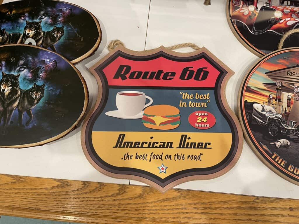 Route 66 sign from inside Peggy Sue's Diner in Yermo, CA