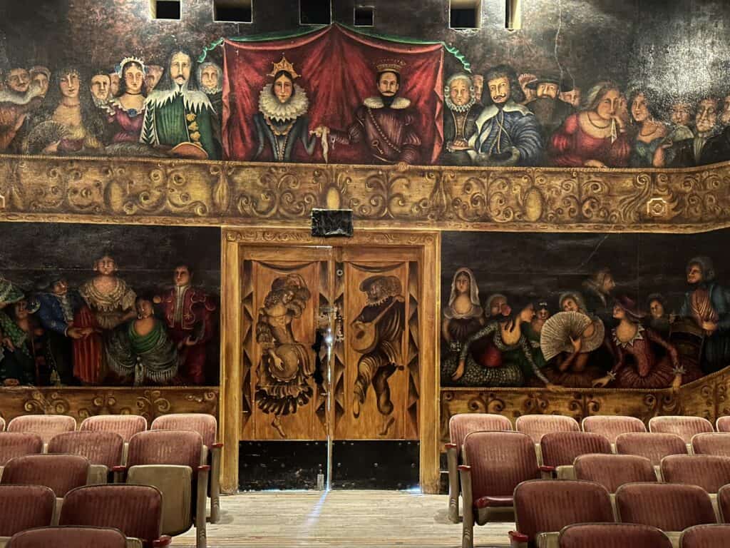 Painted murals around entrance doors into the interior of the Amargosa Opera House