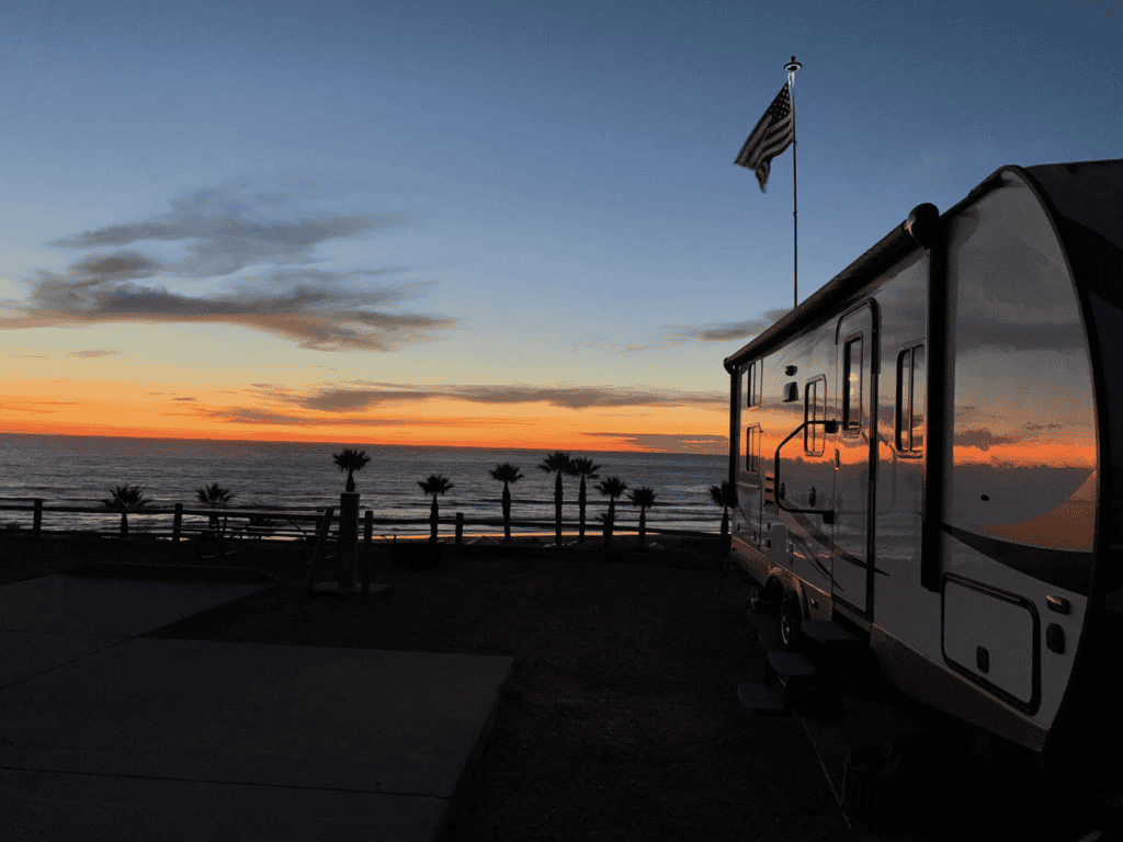 Trailer on the beach at sunset at Jalama Beach
