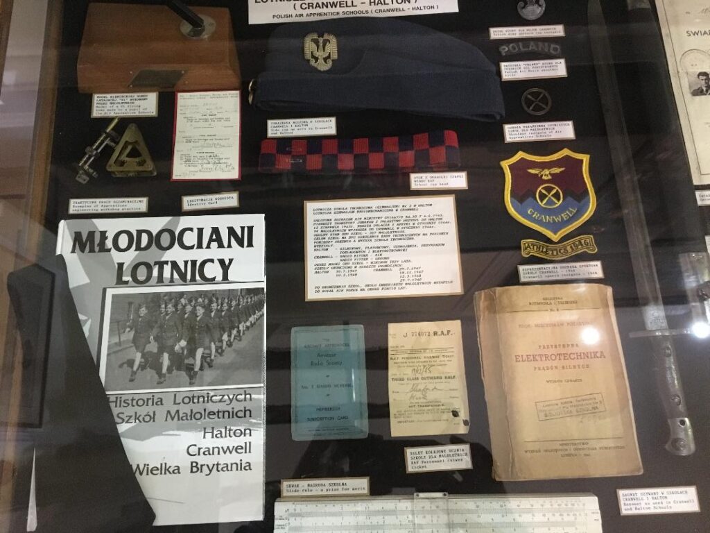 items in a display case from RAF Halton related to young Polish apprentices during World War II era