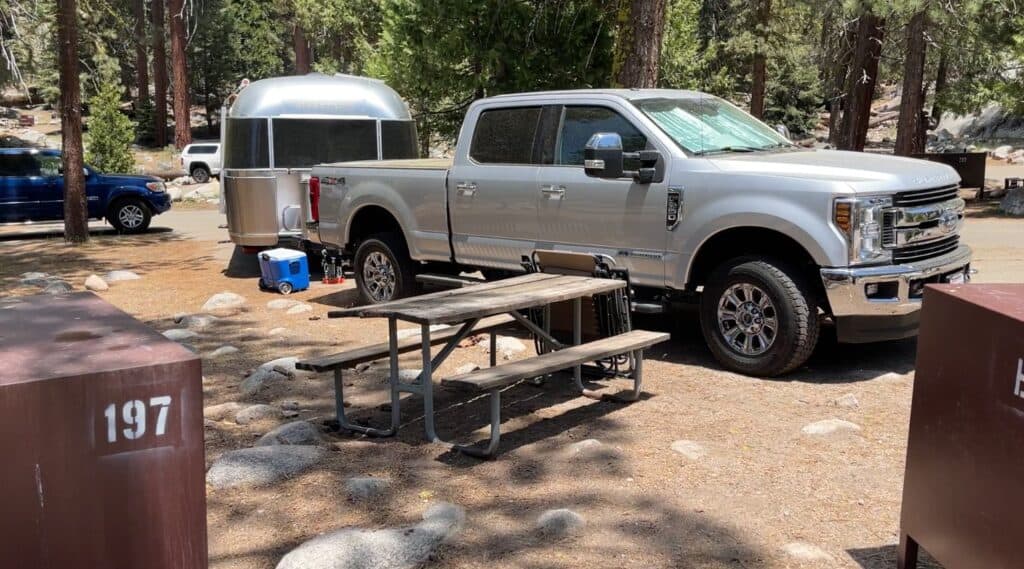 Ford F250 pickup truck and Airstream trailer at a campsite at Lodgepole Campground in Sequoia National Park