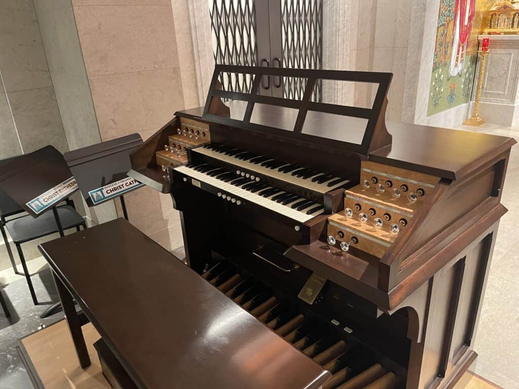 Schoenstein pipe organ inside St. Callistus Chapel at Christ Cathedral in Garden Grove, California, featuring 405 pipes and an ornate wooden organ case.